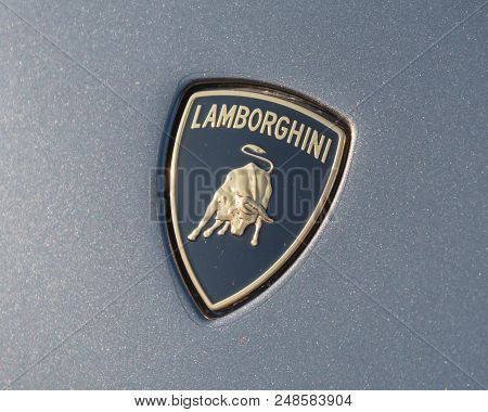 Close-up Lamborghini Logo On Grey Aventador