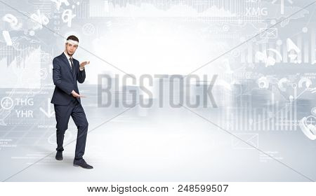 Young suited karate trainer doing karate tricks on the top of a metropolitan city
