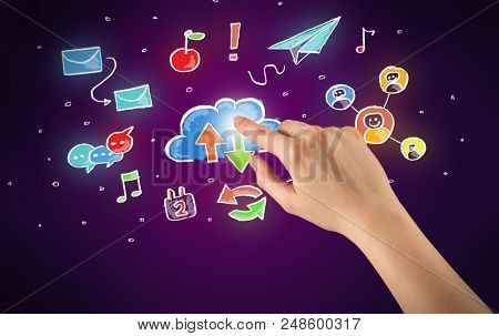 Female hand toucing mixed media icons with purple background