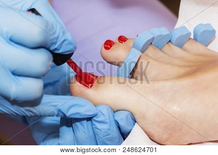 Woman Feet Receiving Pedicure. Close Up Concept