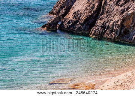 Amazing Ammoudi Beach With Turquoise Water And Beautiful View In Crete Island, Greece .