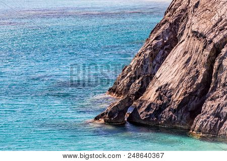 Amazing Ammoudi Beach With Turquoise Water And Beautiful View In Crete Island, Greece .