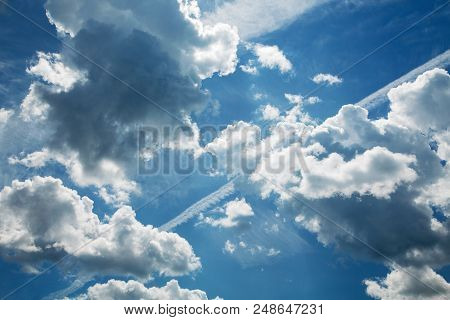 Blue Sky Background With White Clouds