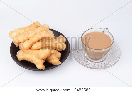 Ready Served Of A Cup Of Coffee And Patongko (deep-fried Dough Stick)