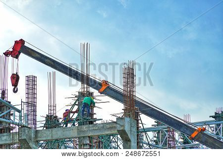 Construction Industry Of Engineer Business Concept With Worker Standing And Working On Building From