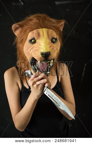 Female Killer With Lion Mask With Knife