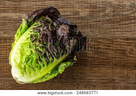 One Whole Fresh Green Lettuce Red Little Gem Variety Flatlay On Brown Wood