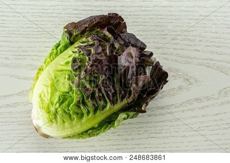 One Whole Fresh Green Lettuce Red Little Gem Variety Flatlay On Grey Wood