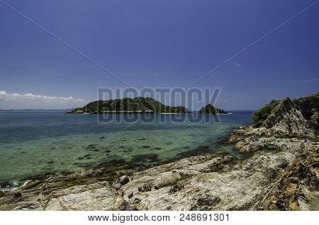 Stunning Seascape View Of Kapas Island Located In Terengganu, Malaysia At Sunny Day With Blue Sky Ba