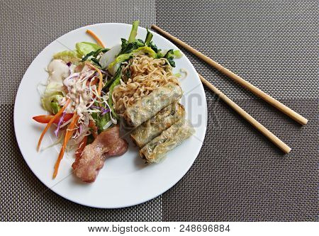 Vietnamese Breakfast On A Plate With Chopsticks