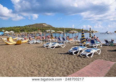 Vulcano Island, Italy - September 9, 2016: People Sunbathe On The Beach On Vulcano Island, One Of Th