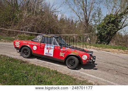 Cesena, Italy - April 8, 2018: Driver And Co-driver On Racing Car Fiat 124 Abarth Running In 12th Ra