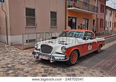 Gatteo, Fc, Italy - May 19, 2017: Driver And Co-driver On A Vintage American Car Studebaker Golden H