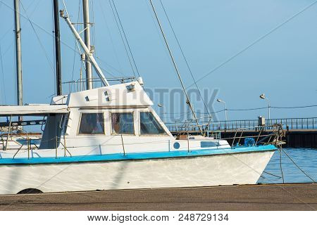 The Yacht Is Parked In The Roadstead And Ready For Travel.
