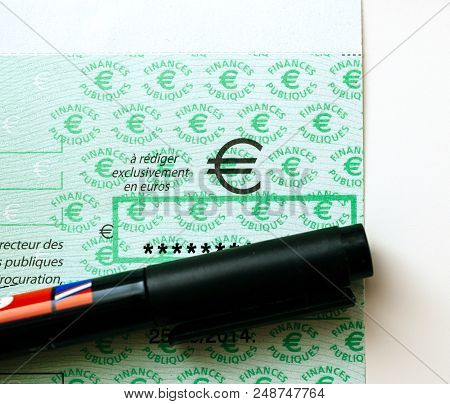 Paris, France - Jan 1, 2015: Marker Covering Secret Detail Of French Cheque Issued By The Direction 