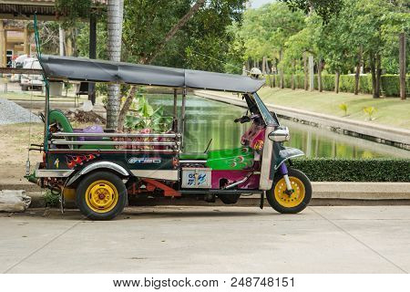 Bangkok, Thailand - Nov 24, 2013: Tuktuk In Downtown Bangkok, Traditional Taxis. Tuktuk Is Popular A