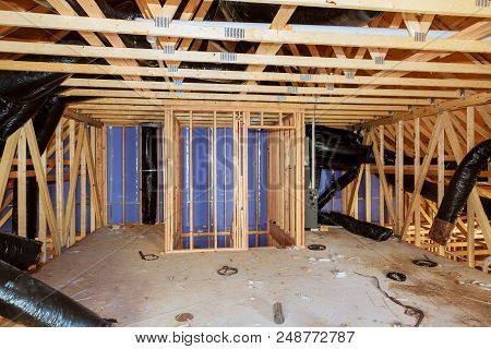 Insulation Of Attic With Fiberglass Cold Barrier And Insulation Material Insulation Attic Heating An