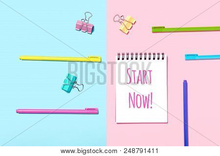 Start Now Motivation In Notebook Or Notepad On Blue And Pink Background. Creative Minimalism Chancer