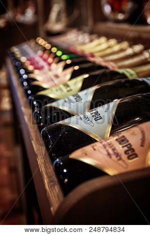 Bottles Of Sparkling Wine On A Wooden Shelf, Abrau-dyurso Winery, Russia - 27 August, 2015