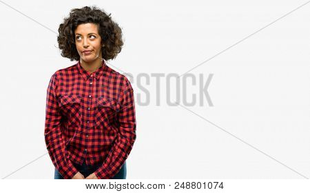 Beautiful arab woman making funny face fooling
