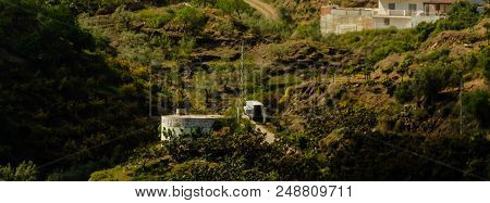 Concrete Irrigation Basin On High Hills In Andalusia, A Place Of Water Storage In Arid Areas