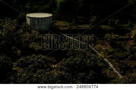 Concrete Irrigation Basin On High Hills In Andalusia, A Place Of Water Storage In Arid Areas