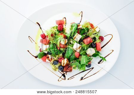 Classic Italian Summer Delicious Fresh Salad With Watermelon, Cheese, Blueberries, Raspberries And S
