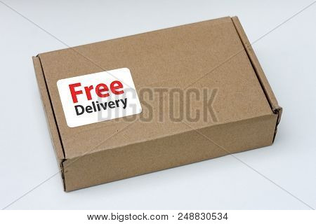 Free Delivery, Business,online Shopping, Ecommerce And Delivery Service Concept - Brown Box With Not