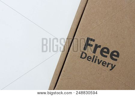Free Delivery, Business,online Shopping, Ecommerce And Delivery Service Concept - Brown Box With Not