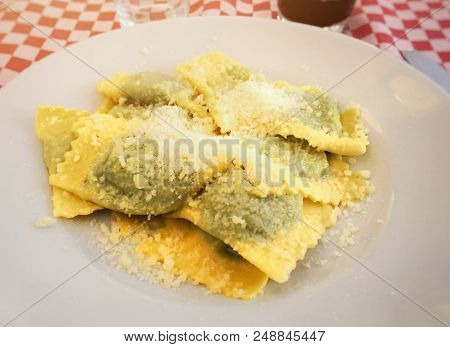 A Typical Recipe Of Italian Cuisine: Emilian Tortelli Stuffed With Spinach And Ricotta And Covered W