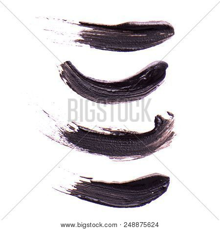 Set Of Black Strokes Of Mascara On A White Background. Texture Of Black Mascara For Eyelashes Isolat