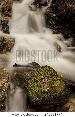 Cascading Waterfall In The Rocky Mountains In Colorado