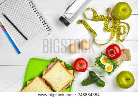 Top View Planning Notebook With Copy Space And Healthy Breakfast. Sandwich With Ham And Cheese, Eggs