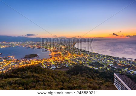 Hakodate, Hokkaido, Japan city skyline from Mt. Hakodate at dawn.