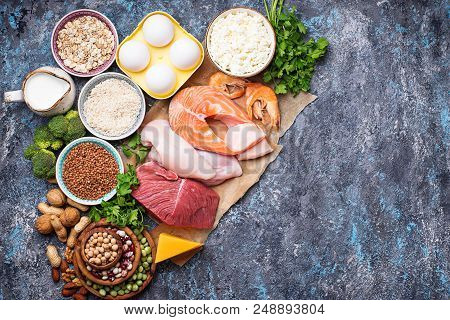 Healthy Food High In Protein. Meat, Fish, Dairy Products, Nuts And Beans