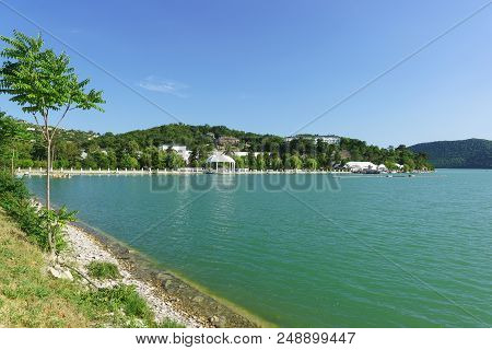 Picturesque Lake Abrau On The Background Of Mountain Slopes. Peace And Quiet In The Resort Village O