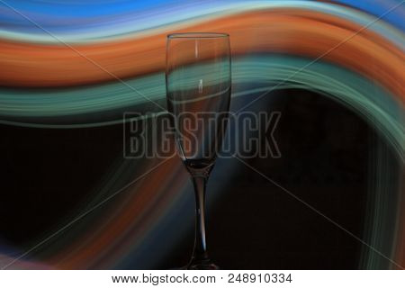Night Photo Of Champagne Glass With Bright Lights