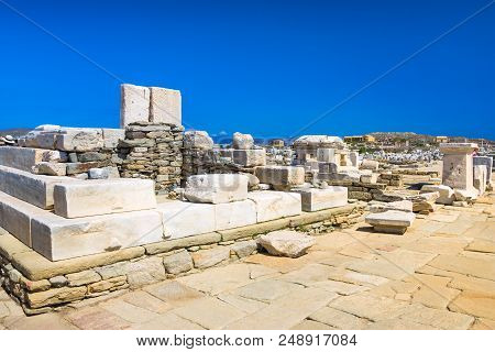 Ancient Ruins In The Island Of Delos In Cyclades, One Of The Most Important Mythological, Historical