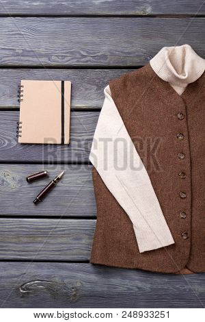 Retro Vintage Penman Clothing. Notepad, Pan And Brown Jacket.