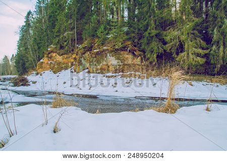 Red Cliffs In Winter At Latvia.