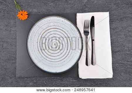 Colorful And Crisp Image Of Common Marigold And Table Setting On Slate