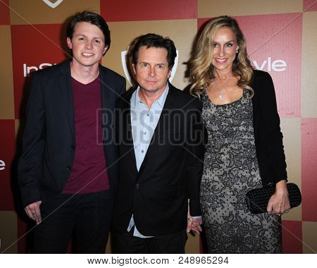 LOS ANGELES - JAN 13:  Michael J Fox, Tracy Pollan & son Sam arrives to the WB/In Style Golden Globe Party  on January 13, 2013 in Hollywood, CA                