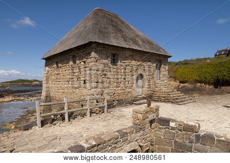 The Moulin De Berlot, An Old Tide Mill On The Ile De Brehat, Off The Coast Of Brittany, France.