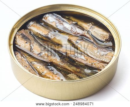 Delicious Juicy Sprats In Oil In An Open Tin Can, White Background, Isolated