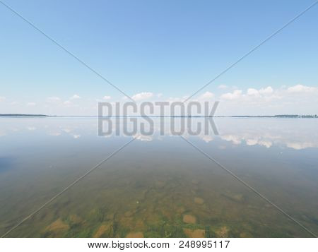 Scenic Landscapes Of Artificial European Goczalkowice Reservoir In Poland With Beauty Clouds On Blue