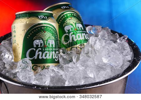 Two Cans Of Chang Beer In Bucket With Crushed Ice