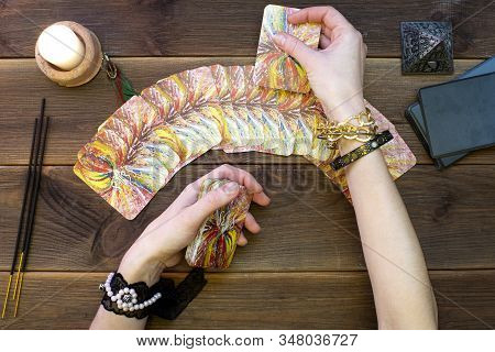 Minsk Belarus 2019 December 07. Fortune Telling Cards, Runic Cards For Fortune Telling On A Wooden T