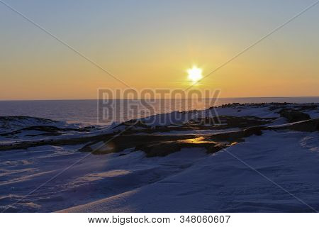 Beautiful Sunset Over An Arctic Landscape Near Whale Cove, Nunavut. Taken During The Winter Month Wi