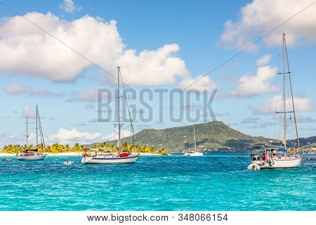 Turquoise Sea And Anchored Yachts At Sandy Beach Island, Near Carriacou Island, Grenada, Caribbean S