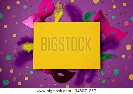 Festive, Colorful Mardi Gras Or Carnivale Mask And Accessories Over Purple Background. Party Invitat